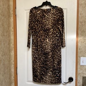 W by Worth 3/4 length sleeve mini dress with black leather accent on shoulders.